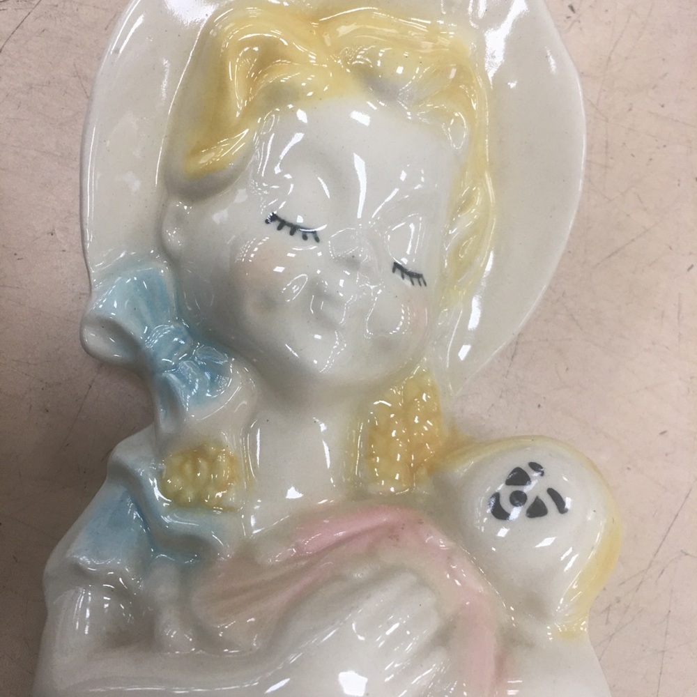 Vintage Shawnee USA girl holding doll planter